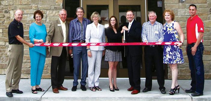 HOME Real Estate - Ribbon cutting photo