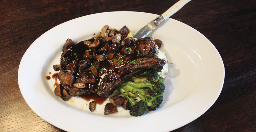 Photo - Piedmont Bistro by Venue - Grilled CAB 16oz Bone-in Ribeye