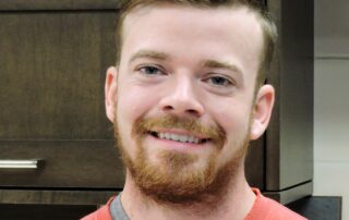 A headshot of Wes Aust.